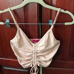 Beige cropped top with front t details